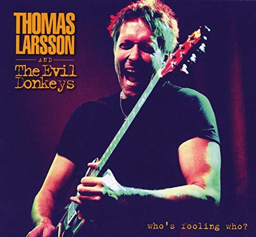 Album cover featuring a man playing guitar with text "Thomas Larsson and The Evil Donkeys".
