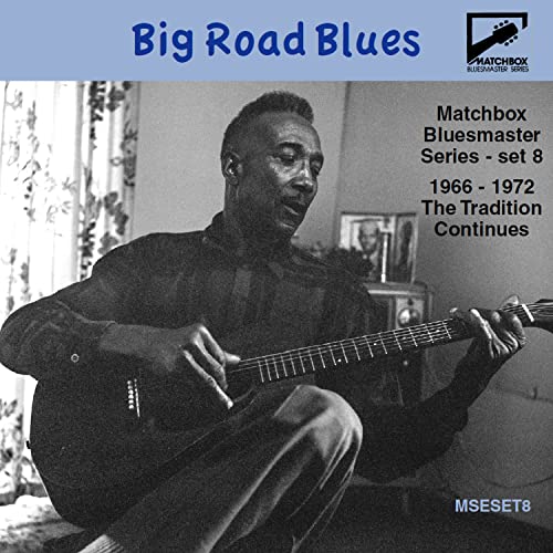 CD cover featuring a Black blues guitarist playing acoustic guitar.