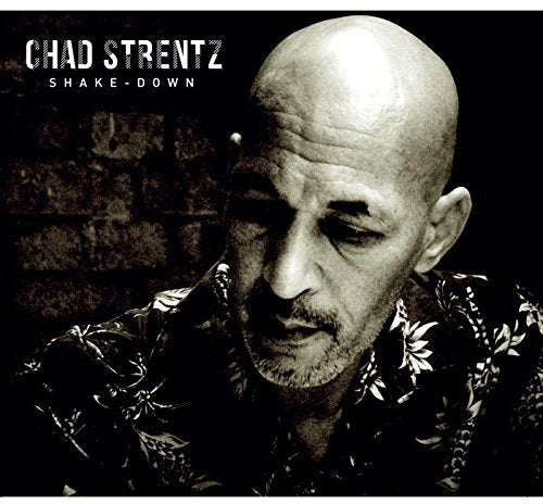 "Black and white album cover featuring Chad Strentz with a serious expression."
