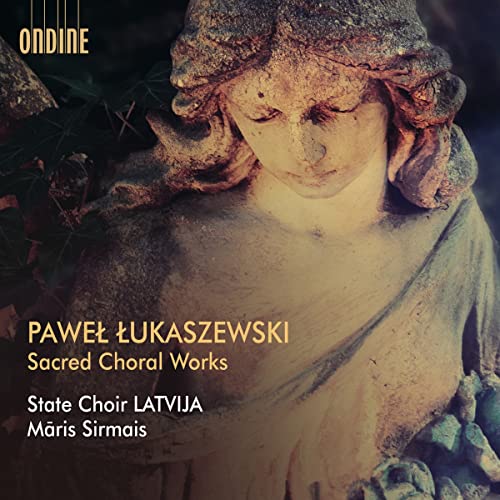 CD cover featuring a close-up of a stone angel’s face.