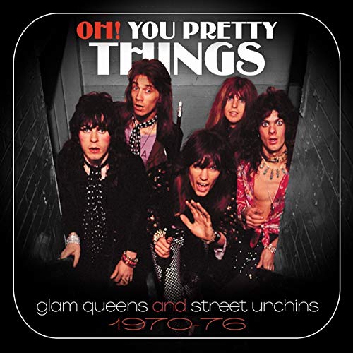 "Album cover featuring five glam-rock musicians in a dark stairwell, with bold title text."