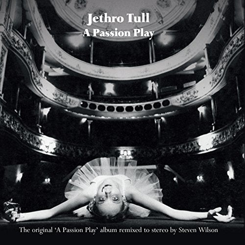 Black and white album cover featuring a ballerina lying under an ornate circular balcony.