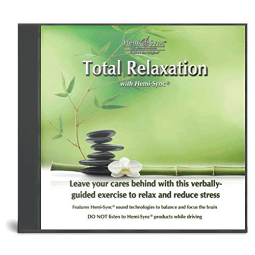 CD case with a green cover featuring stacked stones, leaves, and a white flower.