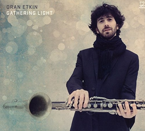 Oran Etkin CD cover featuring a musician with a clarinet and saxophone.