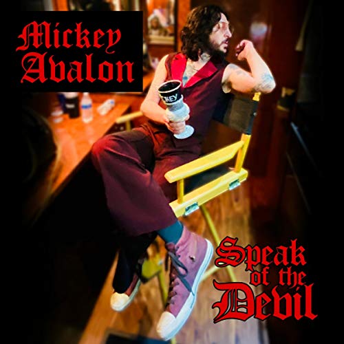 Album cover featuring Mickey Avalon sitting in a yellow director's chair, holding a microphone.