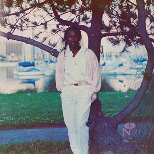 Peter Barclay album cover: man in white suit by trees and water.