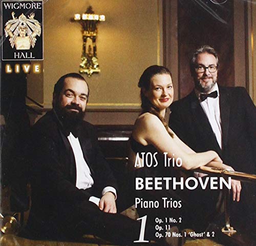 CD cover featuring the Atos Trio, three musicians in formal wear.