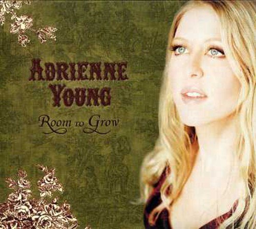 "CD cover featuring a blonde woman with green eyes and ornate green background."