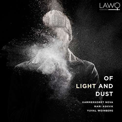 "CD cover with a man surrounded by dust against a dark background."