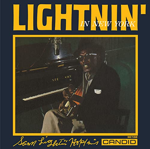 CD cover: Lightnin' Hopkins playing guitar at a piano, in blue tones.