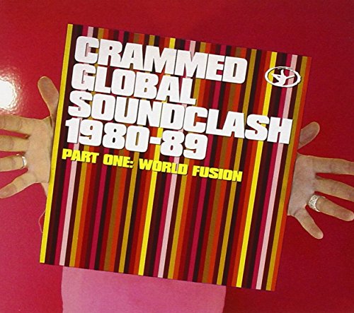 "CD cover with striped background and white text, held by hands against red surface."