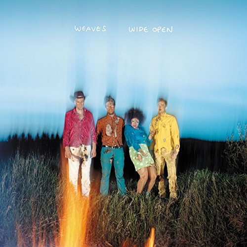 Album cover for Weaves’ “Wide Open” featuring a blurred band in a field.