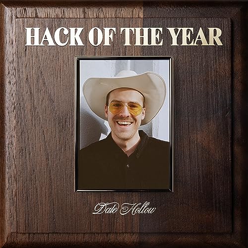 Vinyl record cover featuring a man in a cowboy hat and sunglasses.