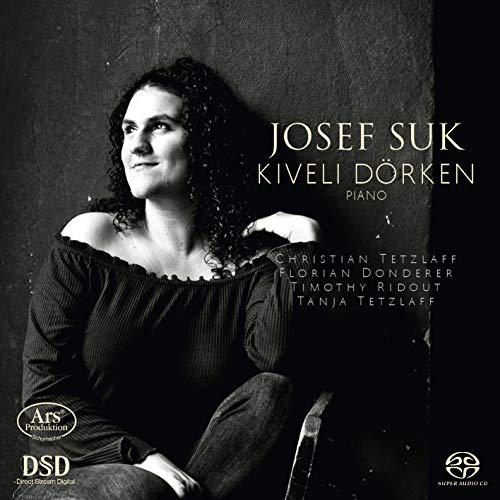Black and white CD cover featuring a woman sitting with her arm resting on a chair.
