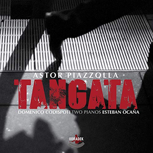 "Album cover with red title 'TANGATA' and black-and-white image of legs on stairs."
