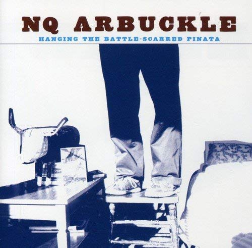 CD cover: legs and torso with a donkey head hanging nearby.