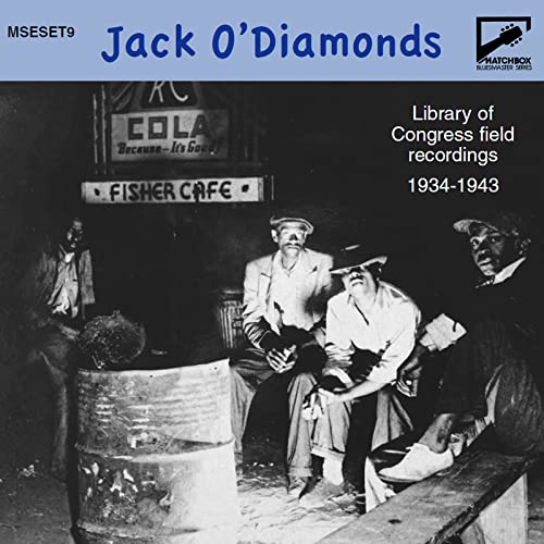 CD cover: Black and white photo of musicians outside a cafe.