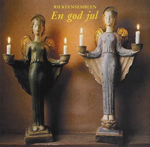 "CD cover featuring two angel statues holding candles, with yellow text on a brown background."
