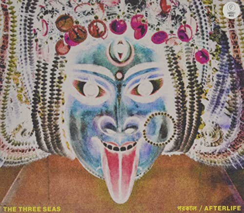 CD cover: painted face with multiple eyes and colorful floral details.