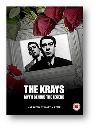 DVD cover featuring black-and-white portrait of two suited men surrounded by red roses.
