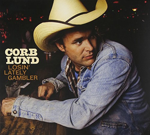 "Album cover featuring a man in a cowboy hat sitting at a bar."