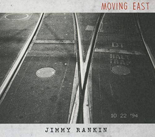 "Album cover with black-and-white train tracks image, 'Moving East' in red, 'Jimmy Rankin' in black."