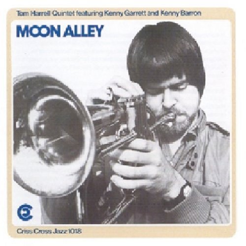 Album cover with black and white photo of man playing trumpet, "Moon Alley" in blue text.