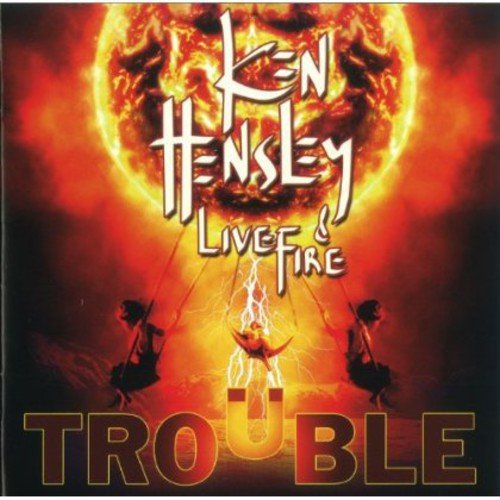 Album cover with "TROUBLE" in bold letters, fiery red background, and silhouetted figures.