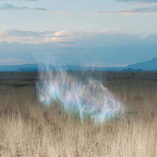 A CD case with a serene landscape cover art featuring a field and cloudy sky.