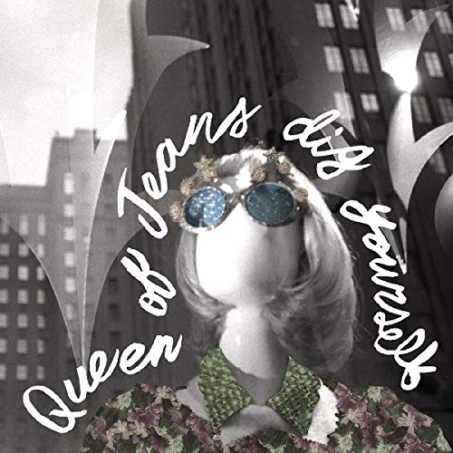 Black-and-white vinyl album cover with a woman wearing sunglasses and floral top.