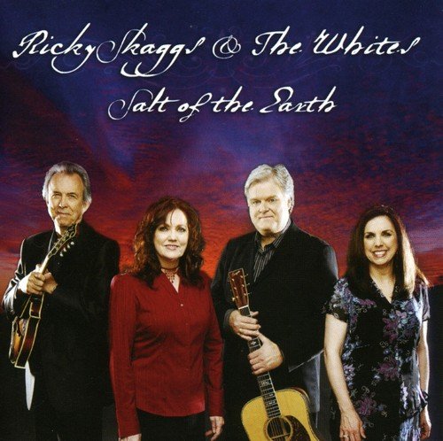 "CD cover featuring four musicians against a red and blue sky background."