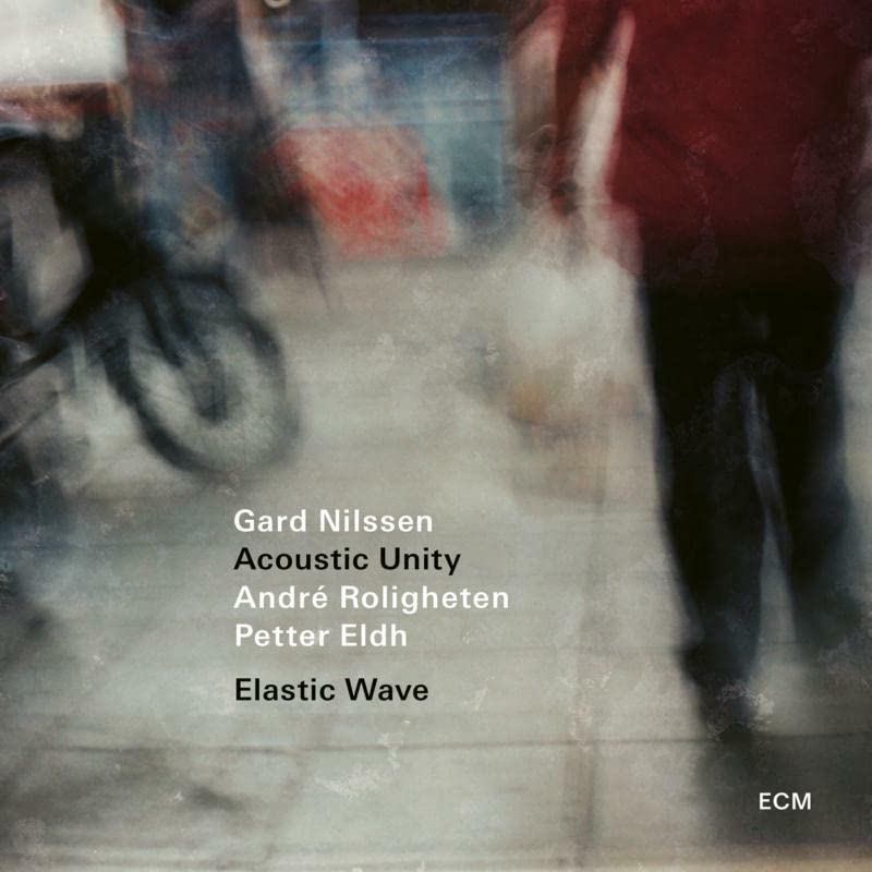 CDSmeared, blurry urban street scene with text for album Elastic Wave by Gard Nilssen.