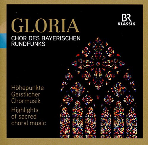 "CD cover with stained-glass window image and gold text on black background."