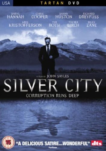 DVD cover for "Silver City" featuring a man in a suit and mountains.