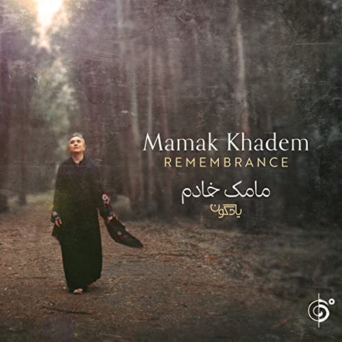 CD cover: woman in black walking down a forest path.