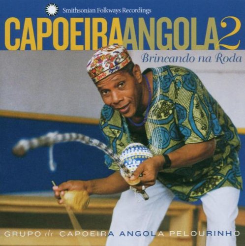 "CD cover featuring a man playing a berimbau, wearing colorful clothing and patterned hat."