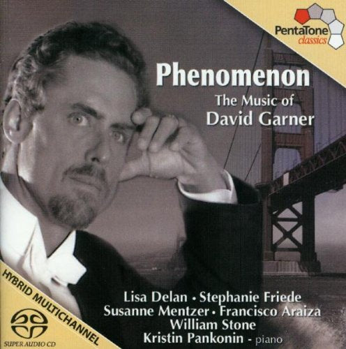 CD cover with a man in a suit and a bridge in the background.