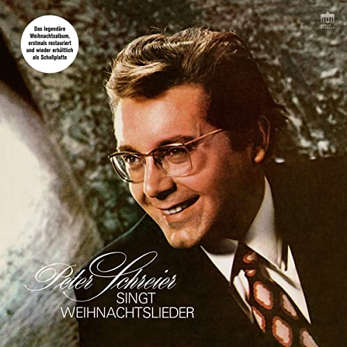 Peter Schreier album cover, portrait of a smiling man wearing glasses.