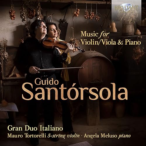 CD cover featuring musicians with violin and piano, rustic background.