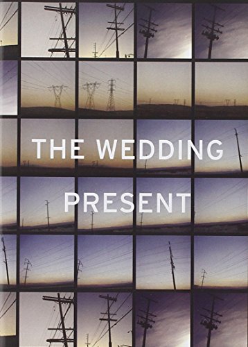 DVD cover for "The Wedding Present - Drive" with grid of power lines at dusk.