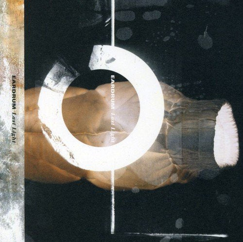 "Eardrum Last Light CD cover with a hand holding a broken white ring."