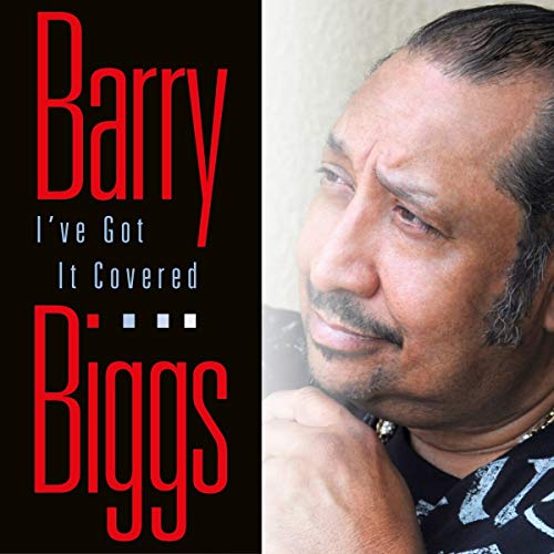 "Album cover with a man in a black shirt and the artist's name."