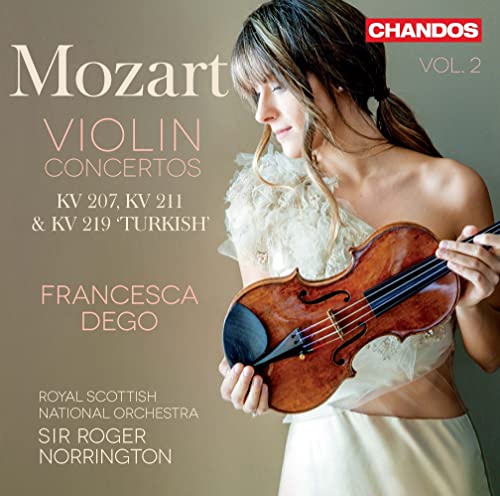 CD cover: violinist Francesca Dego holding a violin, Mozart concertos.
