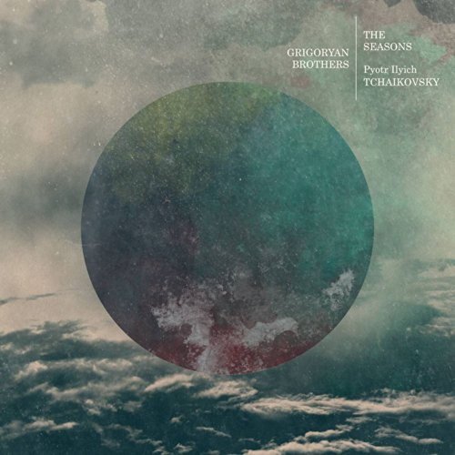 A CD cover with a cloudy background and a large, multicolored circle.