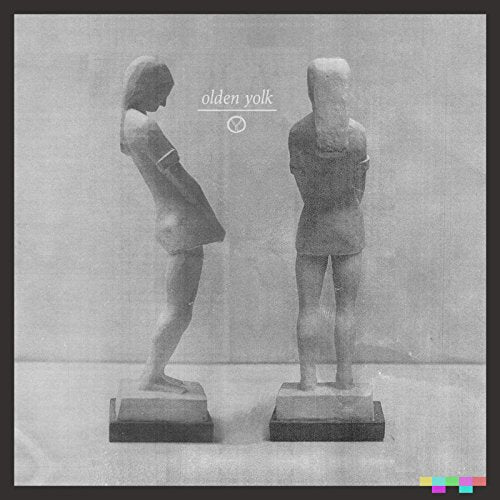 Black and white album cover featuring two rough, sculpted figures.