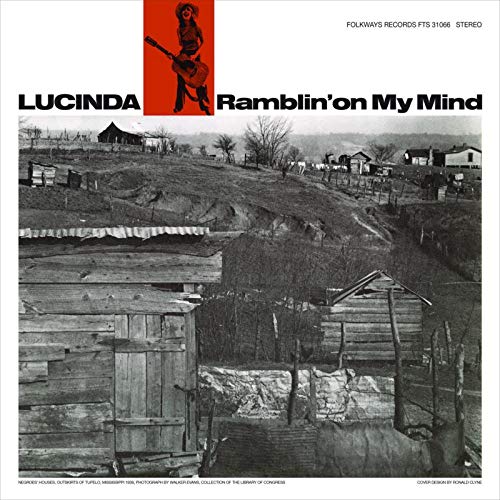 Lucinda Williams album cover, black and white photo of rural buildings.
