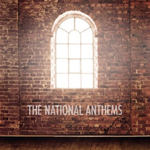 CD cover with a woman silhouetted in a window, brick wall.