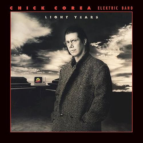 Chick Corea album cover, portrait of a man with stormy sky backdrop.