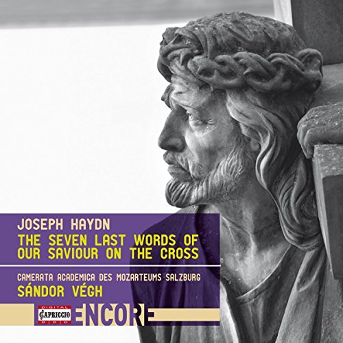 A CD cover featuring a stone statue of Jesus Christ with text overlay.