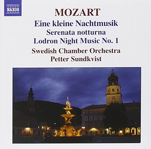 A CD cover featuring a nighttime scene with a lit fountain and tower.